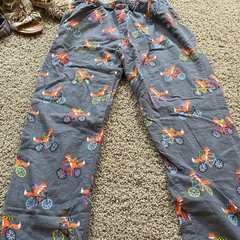 Fox riding a bike fuzzy pjs